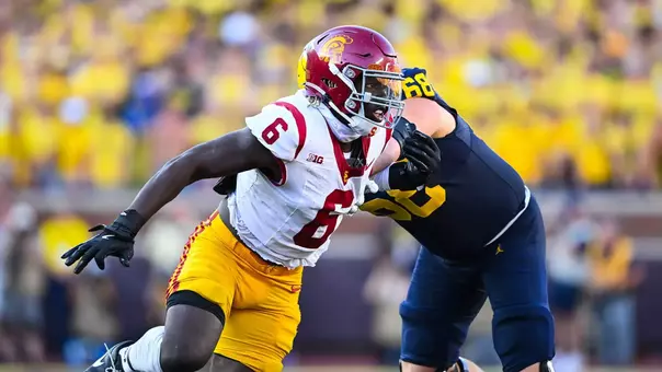 USC Trojans Football edge rusher Anthony Lucas rushes against Michigan Wolverines