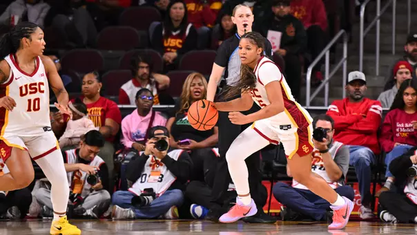 Kara Dunn dribbles a basketball down court during game