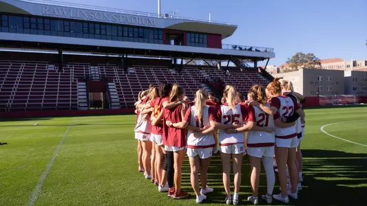 The USC women's lacrosse team huddles during its first practice at Rawlinson Stadium