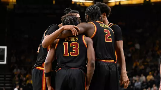USC Men's Basketball huddles against Iowa