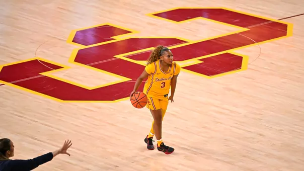 Londynn Jones brings the ball down the court on USC logo