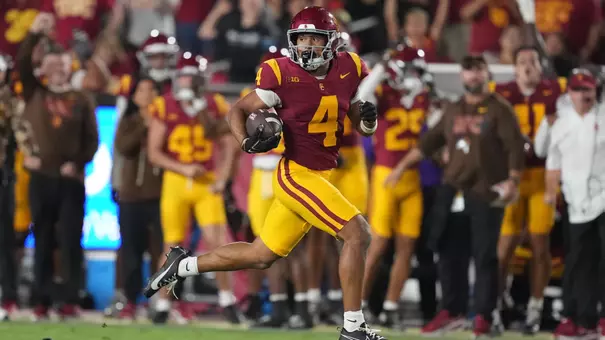 USC's Trent Mosley races downfield.