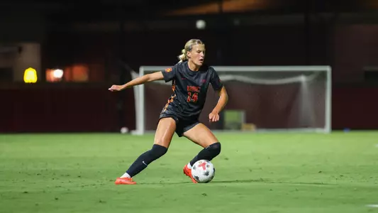 Ashley Thurk dribbles the ball at Rawlinson Stadium.