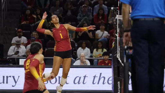 USC women's volleyball outside hitter Adonia Faumuina goes up to hit a ball during a match against Michigan at Galen Center