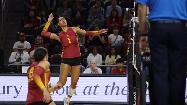 USC women's volleyball outside hitter Adonia Faumuina goes up to hit a ball during a match against Michigan at Galen Center