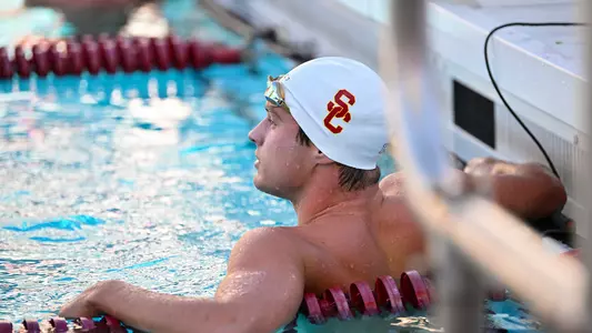 Stuart Timmerman rests on a lane line.