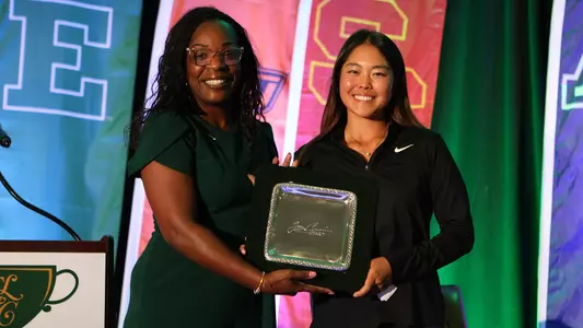 Kylie Chong accepts the Tom Cousins Award at the 2026 East Lake Cup Welcome Banquet