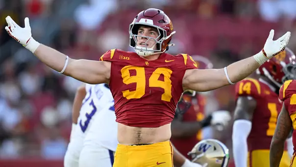 USC Trojans Football defensive end Luke Wafle celebrates against Washington Huskies