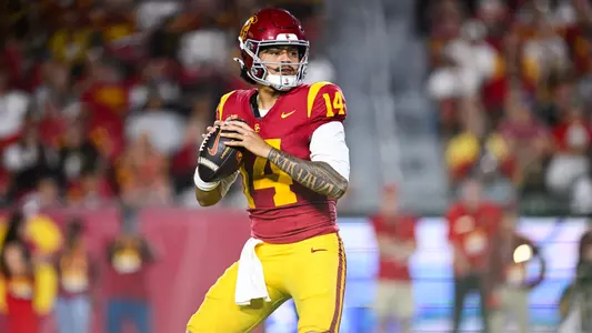 USC quarterback Jayden Maiava drops back to throw downfield.