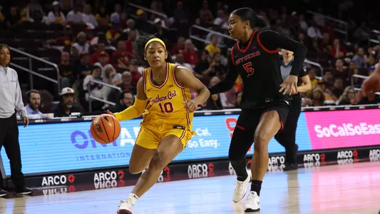 Malia Samuels dribbles on the basketball court