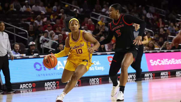 Malia Samuels dribbles on the basketball court