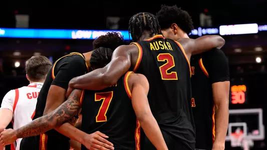 USC Men's Basketball huddles together against Ohio State