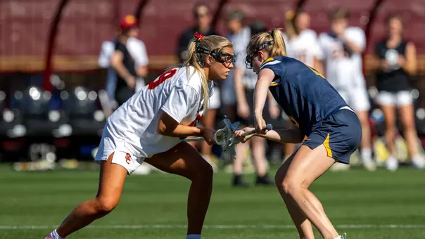 USC lacrosse midfielder Anna Regan prepares to take the draw in a game against California at Rawlinson Stadium