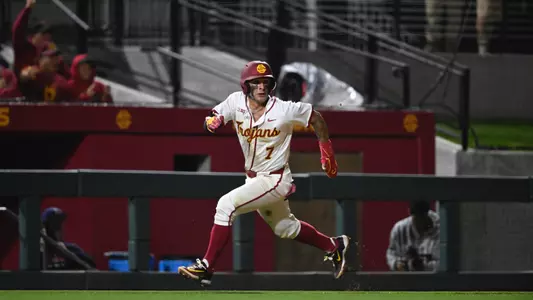 USC Baseball's Abbrie Covarrubias rounds the bases to reach home in season opener vs. Pepperdine.