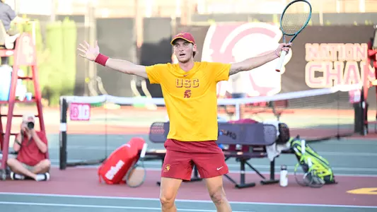 Nathan Trouve celebrates with his hands up in exclamation