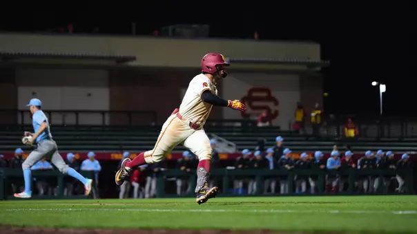 Abbrie Covarrubias runs on base bath in game against LMU.