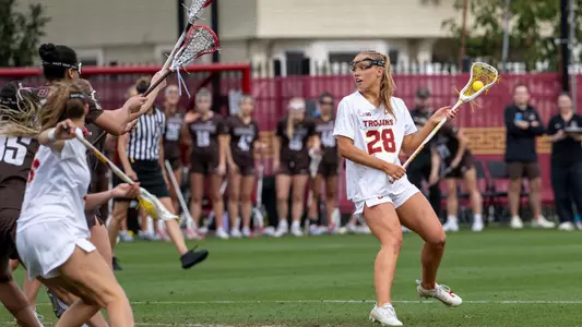 USC lacrosse attacker Emma Bunting gets ready to feed the ball into the arc during a game against Brown at Rawlinson Stadium