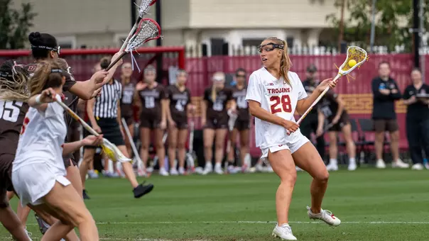 USC lacrosse attacker Emma Bunting gets ready to feed the ball into the arc during a game against Brown at Rawlinson Stadium