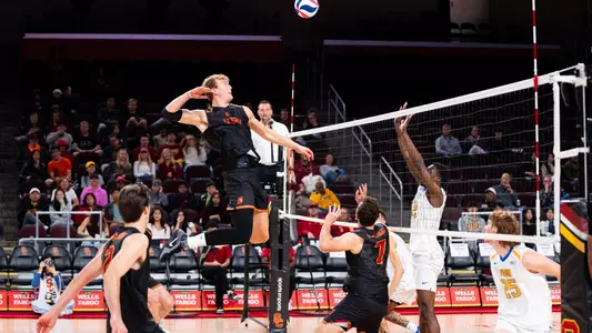 USC men's volleyball middle blocker Wesley Smith goes up to attack the ball during a match against Fort Valley State at Galen Center