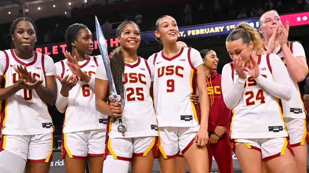 Davidson and Dunn hugging on court