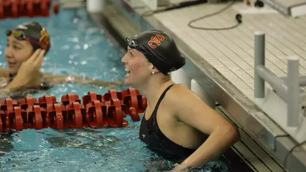 Ashley McMillan smiles as she finishes third place in the 200 Breast at Big Ten Championships.