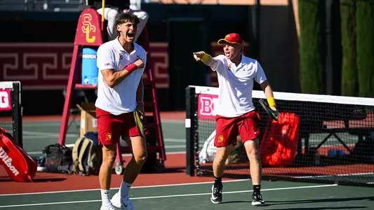 Max Exsted and Nathan Trouve Celebrate on court