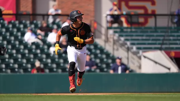 Augie Lopez hits a home run and jogs around the bases in the final game against Rice.