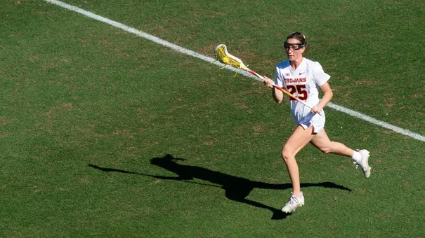 USC lacrosse senior midfielder Casey Roberts brings the ball across the field during a game at Rawlinson Stadium
