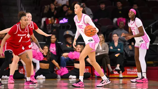 jazzy davidson dribbled ball wearing pink jersey