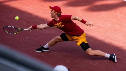 Max Exsted makes a tough shot on court.