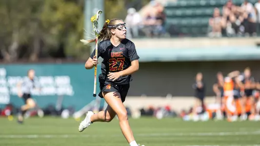 USC lacrosse sophomore attacker Kaylee Fravert transitions the ball in a game against Stanford at Laird Q. Cagan Stadium