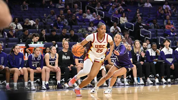 Kara Dunn dribbles past an opponent at Welsh Ryan Arena.