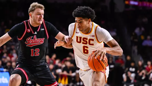 Jacob Cofie drives to the basket against Indiana