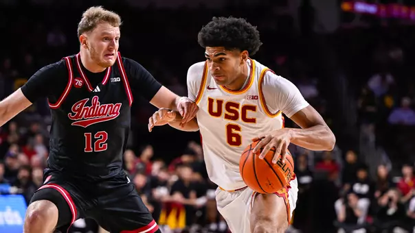 Jacob Cofie drives to the basket against Indiana