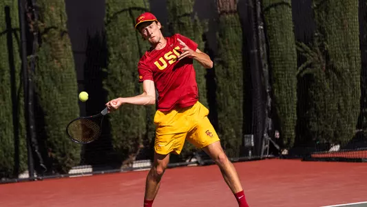 Branko Djuric hits a return on court.