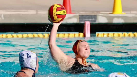 Madi Haaland-Ford passing the ball