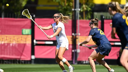 USC lacrosse attacker Reese Robinson passes the ball during a game against Michigan at Rawlinson Stadium