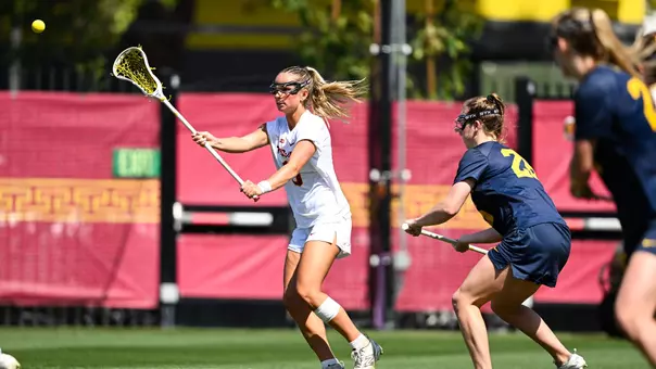 USC lacrosse attacker Reese Robinson passes the ball during a game against Michigan at Rawlinson Stadium