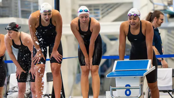 Minna Abraham, Justina Kozan and Bella Brito in 400y medley relay