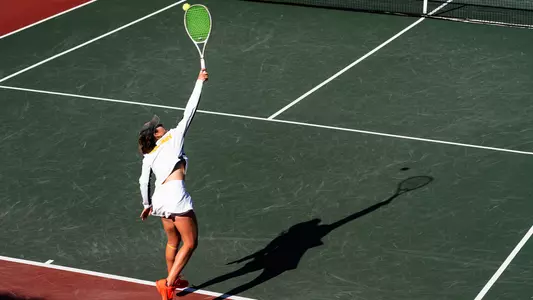 Emma Charney hits an overhead shot