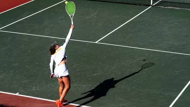 Emma Charney hits an overhead shot