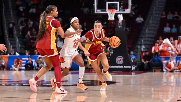 Jazzy Davidson drives past a defender on court