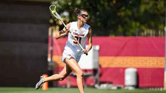 USC lacrosse defender Sophie Gangemi transitions the ball from defense to offense during a game against Michigan at Rawlinson Stadium
