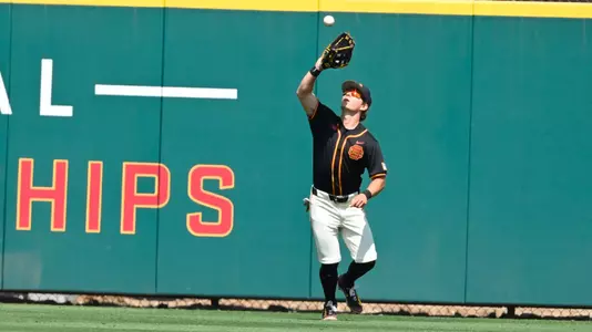 Brock Slaton catching a flyout vs. Oregon State