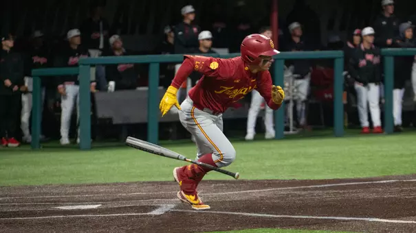 Augie Lopez hustles down the line after an infield hit in the first game against the Maryland Terrapins.