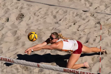Bella Satterwhite dives for a ball at Merle Norman Stadium