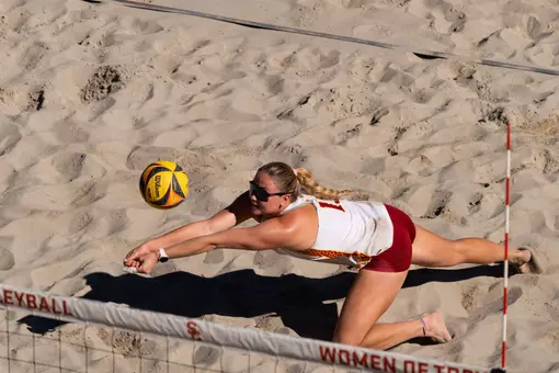 Bella Satterwhite dives for a ball at Merle Norman Stadium