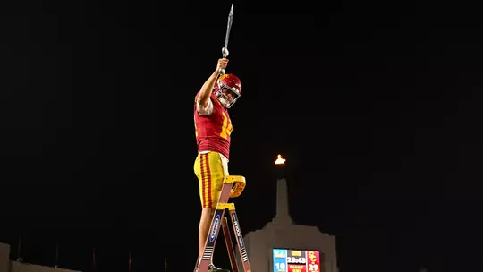 USC Trojans Football quarterback Jayden Maiava leads marching band after win over Michigan Wolverines