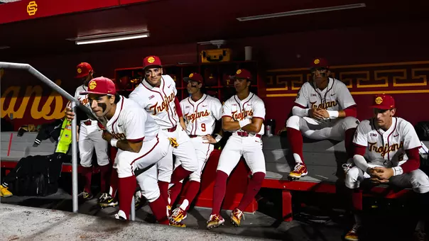 Team in dugout prior to starting lineups being announced.