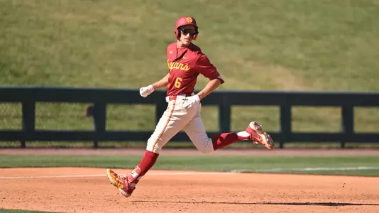 Dean Carpentier on the base path in second game against Illinois.